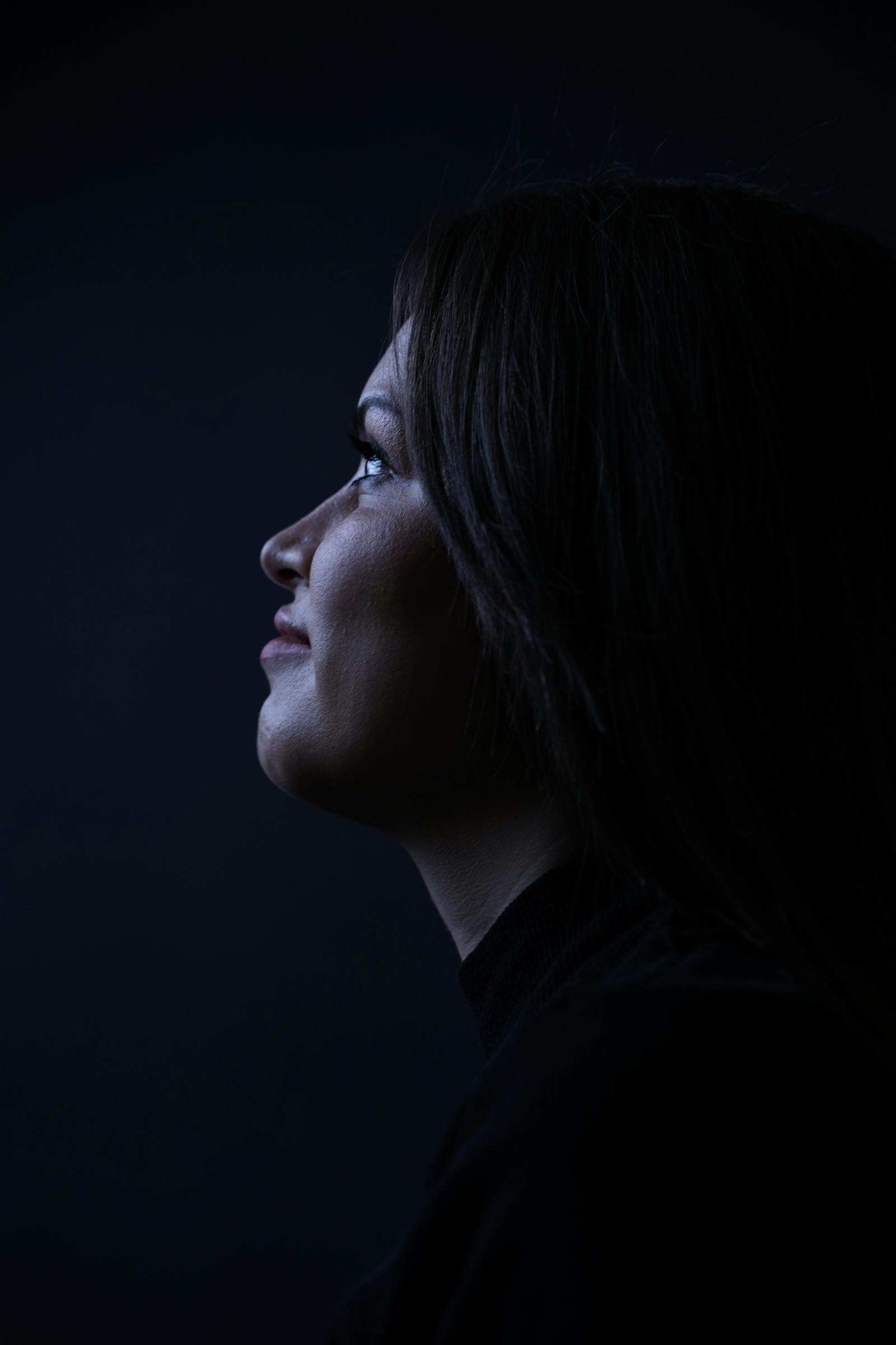 Side-profile portrait supporting natural-results educational messaging.